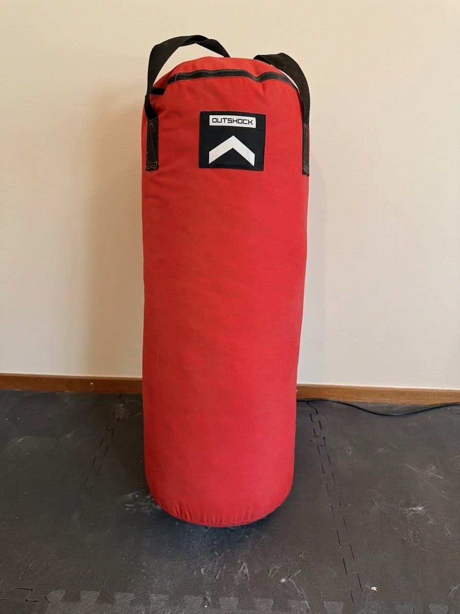 Outshock red punching bag, with suspension